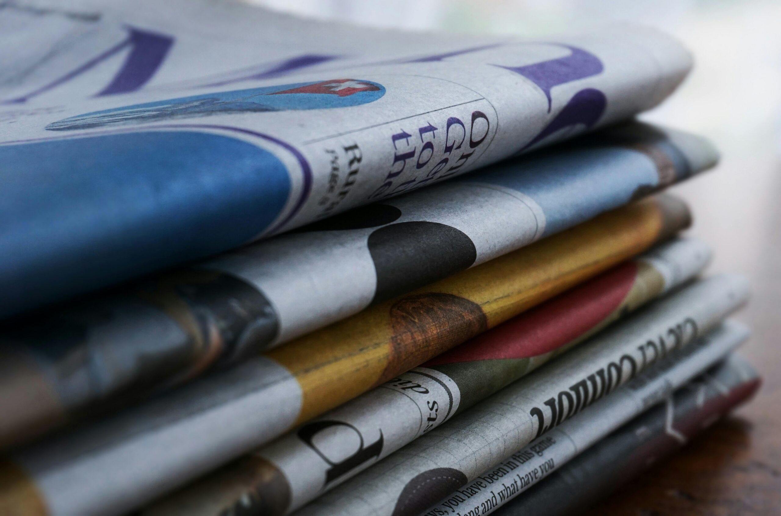 Close up image of a stack of newspapers